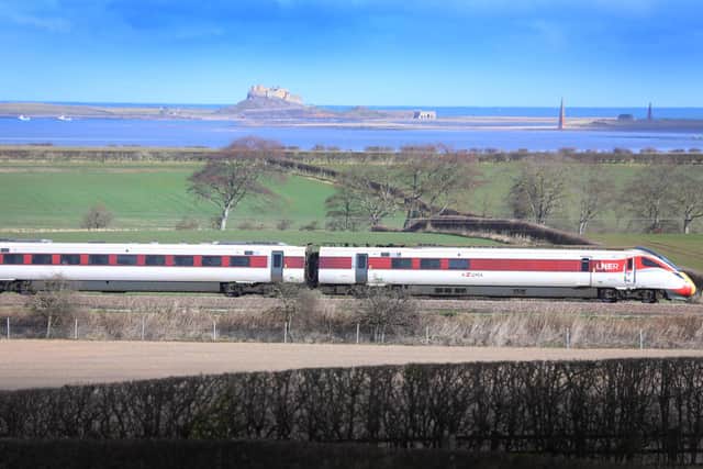 The LNER Azuma train with a view of Lindisfarne, Northumberland, on its way South. Pic: Contributed