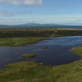 One of the newly-discovered crannogs discovered on Uist, with the artificial island pictured in the bottom left of the loch. The sites were built from rocks and used for settlement or rituals more than 5,000 years ago. PIC: Islands of Stone.