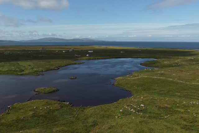 One of the newly-discovered crannogs discovered on Uist, with the artificial island pictured in the bottom left of the loch. The sites were built from rocks and used for settlement or rituals more than 5,000 years ago. PIC: Islands of Stone.