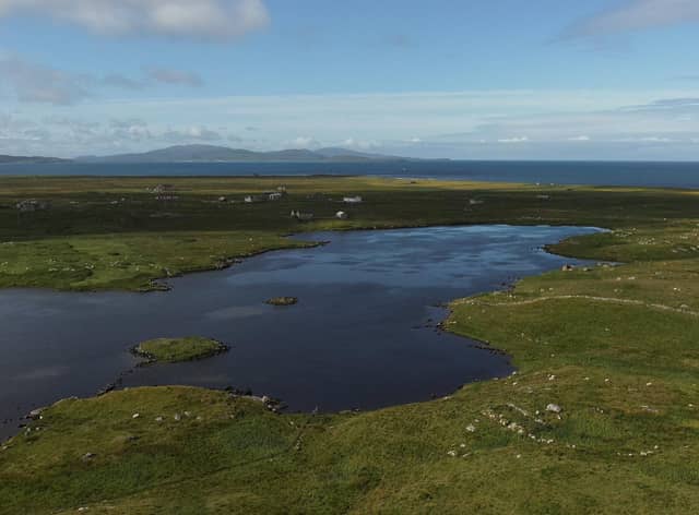 One of the newly-discovered crannogs discovered on Uist, with the artificial island pictured in the bottom left of the loch. The sites were built from rocks and used for settlement or rituals more than 5,000 years ago. PIC: Islands of Stone.