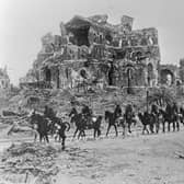 British cavalry passing the remains of the Basilica of Our Lady of Brebières, Albert, after the Second Battle of the Somme, 22 August 1918 PIC: Hulton Archive/Getty Images
