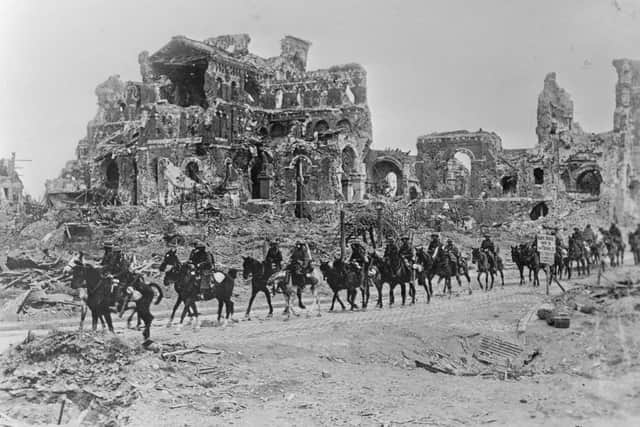 British cavalry passing the remains of the Basilica of Our Lady of Brebières, Albert, after the Second Battle of the Somme, 22 August 1918 PIC: Hulton Archive/Getty Images
