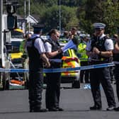 Police in Southport, Merseyside, where a man has been detained and a knife has been seized after a number of people were injured in a reported stabbing. Photo: James Speakman/PA Wire