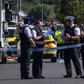 Police in Southport, Merseyside, where a man has been detained and a knife has been seized after a number of people were injured in a reported stabbing. Photo: James Speakman/PA Wire