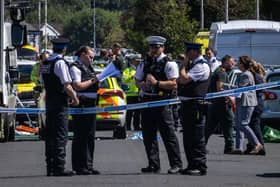 Police in Southport, Merseyside, where a man has been detained and a knife has been seized after a number of people were injured in a reported stabbing. Photo: James Speakman/PA Wire