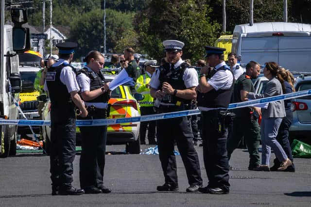 Police in Southport, Merseyside, where a man has been detained and a knife has been seized after a number of people were injured in a reported stabbing. Photo: James Speakman/PA Wire