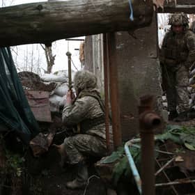 Ukrainian soldiers keep watch on the frontline with Russia-backed separatists, not far from town of Avdiivka, Donetsk, on Friday (Picture: Anatolii Stepanov/AFP via Getty Images)