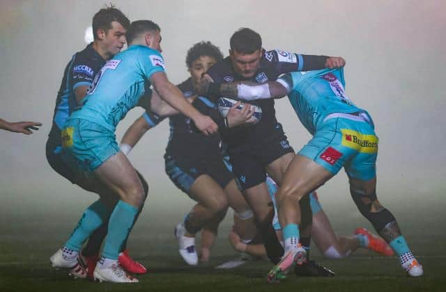 Glasgow's Cole Forbes (centre) is tackled during Glasgow Warriors v Exeter Chiefs. (Photo by Craig Williamson / SNS Group)