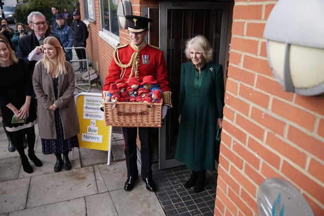 The Queen Consort during a special teddy bears picnic at a Barnardo's Nursery in Bow, London, where she personally delivered Paddington Bears and other cuddly toys, which were left as tributes to Queen Elizabeth II at Royal Residences, to children supported by the charity. Picture date: Thursday November 24, 2022.