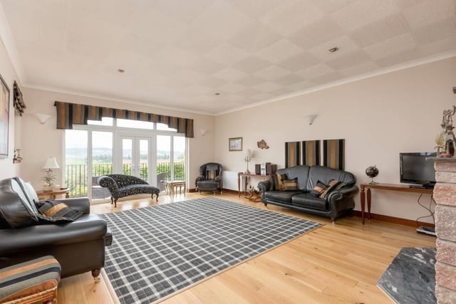 Sitting room with French doors to balcony.