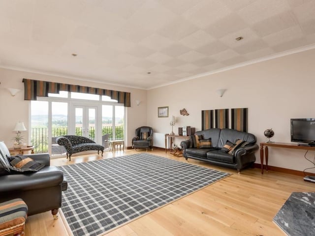 Sitting room with French doors to balcony.