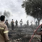 Firefighters tackle the raging wildfires in Greece. Image: Sarah George/Press Association.