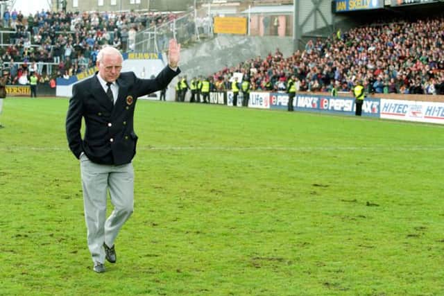 Jim McLean waves to the Dundee Utd supporters after his last match as manager in 1993