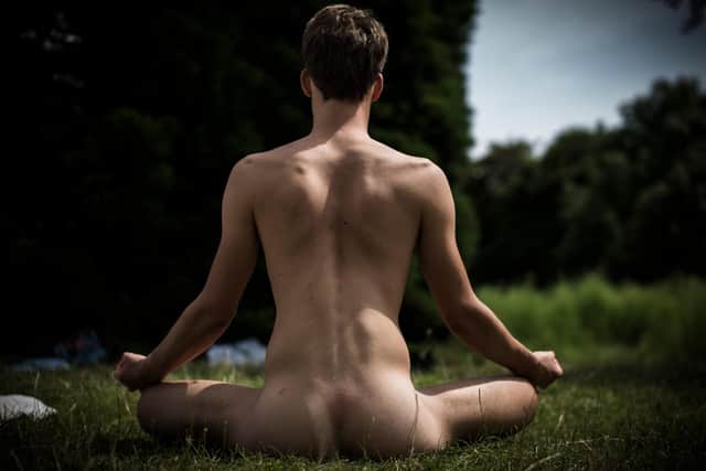 Naturists take part in a range of activities including swimming and yoga (Picture: Philippe Lopez/AFP via Getty Images)