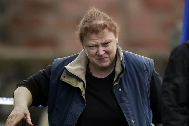 Black in Coatbridge in 2013 searching a gravesite in the Moira Anderson case.