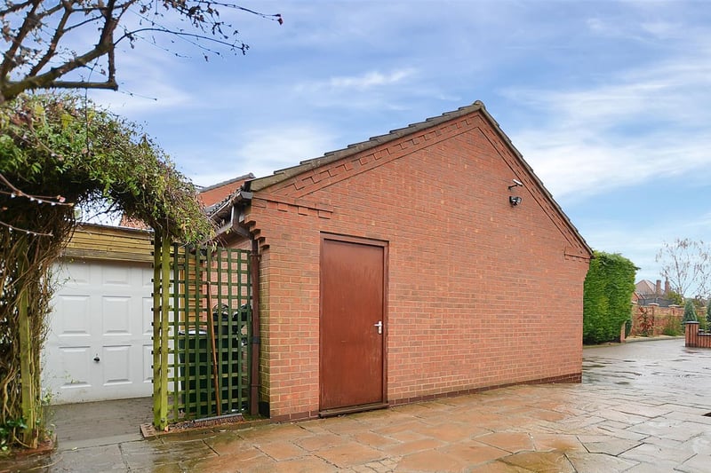 Behind the main garage is an additional garage which is a great storage facility.