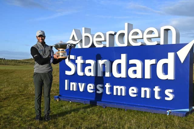 Aaron Rai poses with the trophy after winning the 2020 Aberdeen Standard Investments Scottish Open at The Renaissance Club. Picture: Ross Kinnaird/Getty Images.