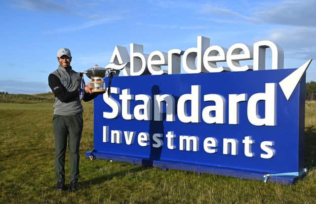 Aaron Rai poses with the trophy after winning the 2020 Aberdeen Standard Investments Scottish Open at The Renaissance Club. Picture: Ross Kinnaird/Getty Images.