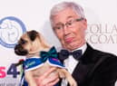 Paul O'Grady and friend at Battersea Dogs' Home's Collars and Coats Ball in 2017 (Picture: Jeff Spicer/Getty)