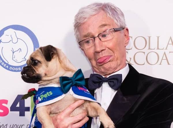 Paul O'Grady and friend at Battersea Dogs' Home's Collars and Coats Ball in 2017 (Picture: Jeff Spicer/Getty)