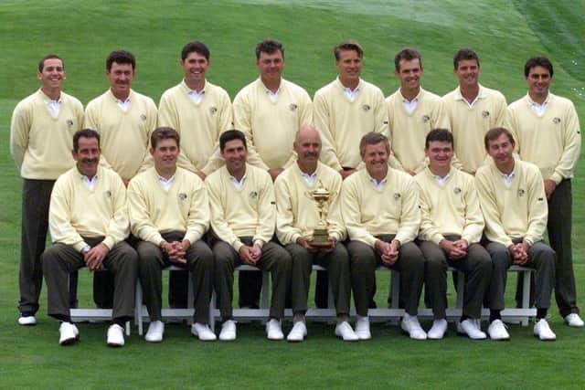 Andrew Coltart, back row third right, and Paul Lawrie, front right second right, were team-mates for Europe in 1999. Picture: Timothy A. Clary/AFP via Getty Images.