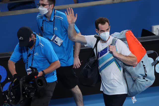 Andy Murray walks off the court after winning against Viktor Durasovic of Norway in their men's singles match at the Sydney Classic.