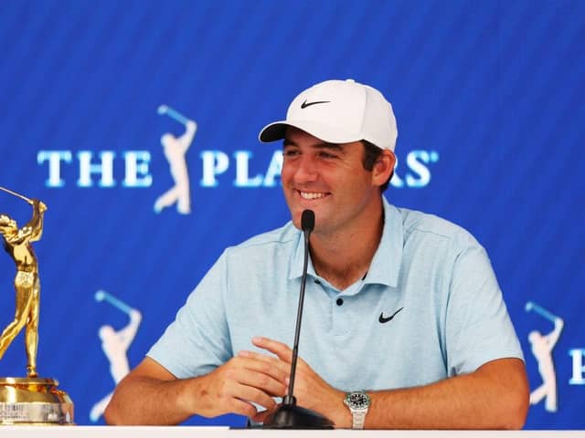 A smiling Scottie Scheffler talks to the media after winning The Players Championship on the Stadium Course at TPC Sawgrass in Ponte Vedra Beach, Florida. Picture: Mike Ehrmann/Getty Images.