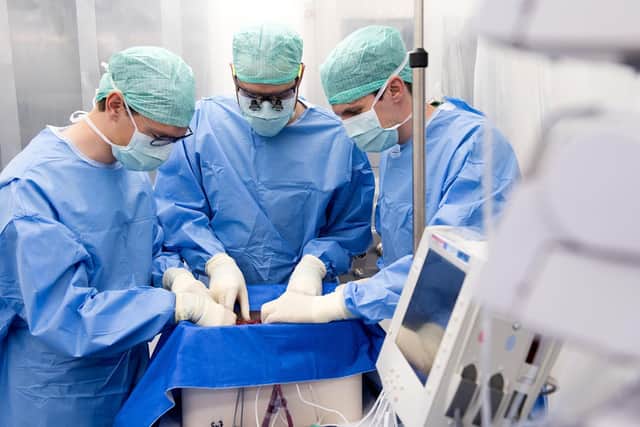 The University Hospital Zurich of the Wyss Zurich team connecting the donor liver to the perfusion machine in the clean room. Picture: University Hospital Zurich/PA Wire