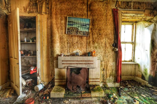 Inside the "time capsule" house at Ness, Isle of Lewis, that is slowly slipping away as the elements take hold. PIC: Tommy McPhelim.