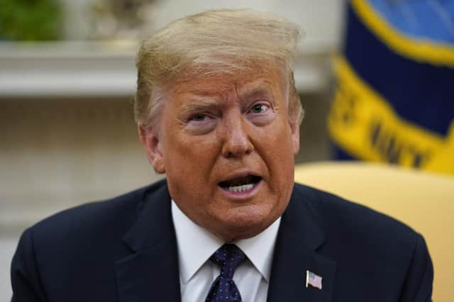 Donald Trump on, arguably, one of his better hair days (Picture: pool/Getty Images)