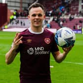 Lawrence Shankland scored a hat-trick in Hearts' 6-1 win over Ross County.