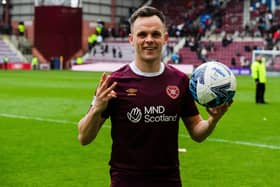 Lawrence Shankland scored a hat-trick in Hearts' 6-1 win over Ross County.