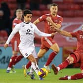 Aberdeen forward Christian Ramirez tries to close down Ross County's Yan Dhanda during the 0-0 draw at Pittodrie.