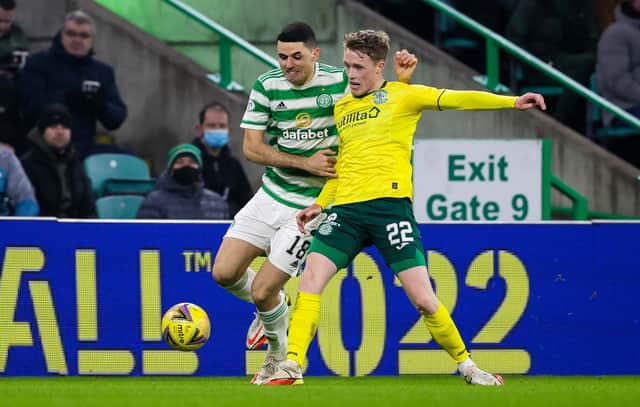 Hibs midfielder Jake Doyle-Hayes challenges Tom Rogic during the defeat at Celtic Park on Monday (Photo by Alan Harvey / SNS Group)