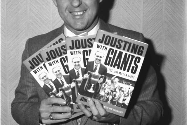 Jim McLean, manager of Dundee United FC, with his autobiography 'Jousting with Giants' in November 1987.