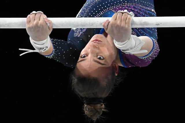 Shannon Archer competes in the women's uneven bars final artistic gymnastics event at the Arena Birmingham. (Photo by BEN STANSALL/AFP via Getty Images)