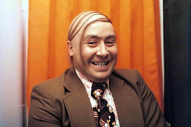 Glaikit Gregor Fisher in his classic cigar-ad incarnation as the Baldy Man