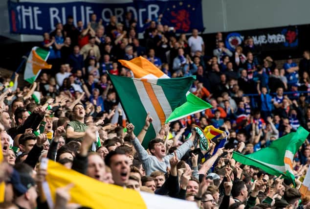 Celtic and Rangers fans at Ibrox in 2017 - when large away supports were still permitted.