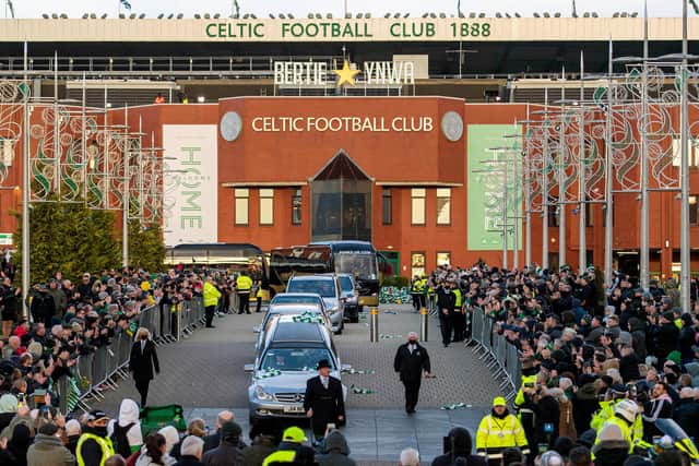 Celtic fans pay respect as Lisbon Lion legend Bertie Auld's funeral cortege passes Celtic Park. (Photo by Ross MacDonald / SNS Group)