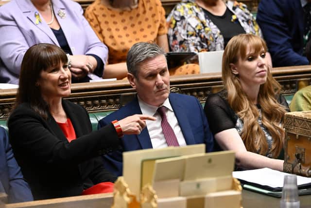 Labour Party Shadow Chancellor of the Exchequer Rachel Reeves, Labour Party leader Keir Starmer, and Labour Party deputy leader Angela Rayner  attend prime minister's questions in the House of Commons in London on May 18th, 2022. Photo: JESSICA TAYLOR / UK PARLIAMENT / AFP via Getty Images.