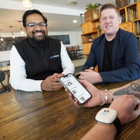 Novosound CEO and co-founder Dave Hughes (pictured centre) with the firm's ultrasound blood pressure monitor. Picture by Stewart Attwood