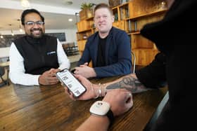 Novosound CEO and co-founder Dave Hughes (pictured centre) with the firm's ultrasound blood pressure monitor. Picture by Stewart Attwood