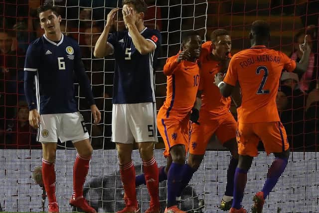 Depay Memphis of Netherlands celebrates after he scores his teams first goal against Scotland at Pittodrie. (Photo by Ian MacNicol/Getty Images)