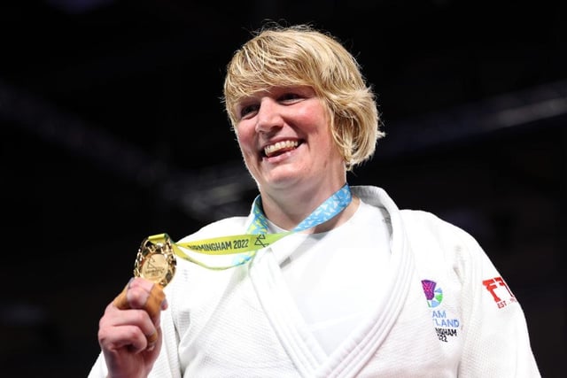 Sarah Adlington receives her gold medal after winning the Women's Judo +78 kg.
