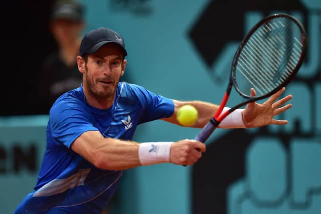 Andy Murray of Great Britain plays a backhand in their second round match against Denis Shapovalov of Canada during day six of Mutua Madrid Open at La Caja Magica on May 03, 2022 in Madrid, Spain. (Photo by Denis Doyle/Getty Images)