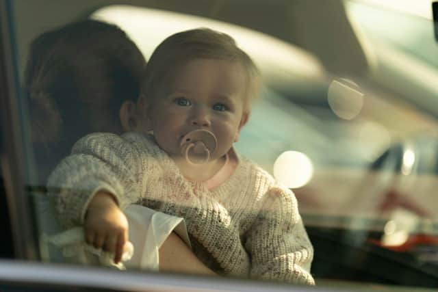 child in car