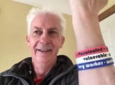 Brian Henderson proposed that a simple coloured wristband scheme could let people know how safe others are and prevent the spread of Covid-19