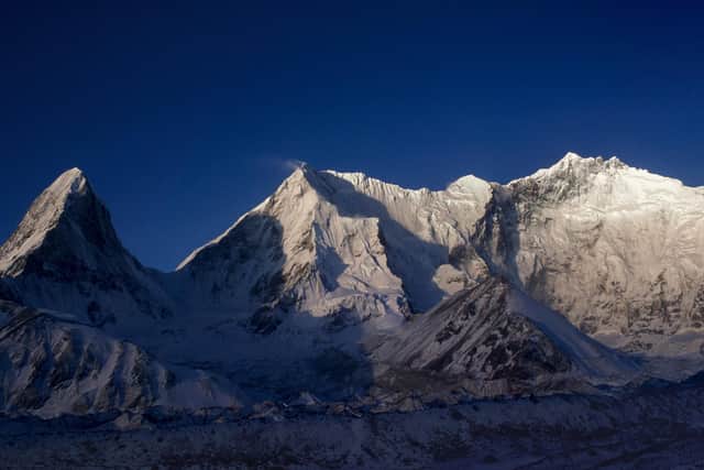 The Kangshung Face. Sunrise panorama from Base Camp. Left to right: Pethangtse, Shartse, Peak 38, Lhotse, South Col, Everest.