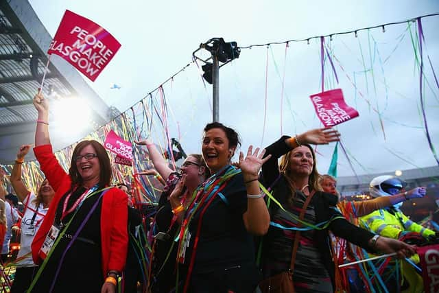 Revellers soak up the atmosphere during the Closing Ceremony for the Glasgow 2014 Commonwealth Games at Hampden Park.