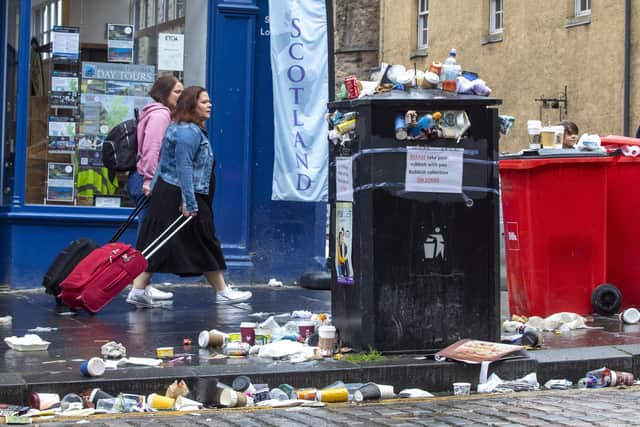 Overflowing bins on the Royal Mile during the 2022 bin strike. Image: Katielee Arrowsmith/SWNS.